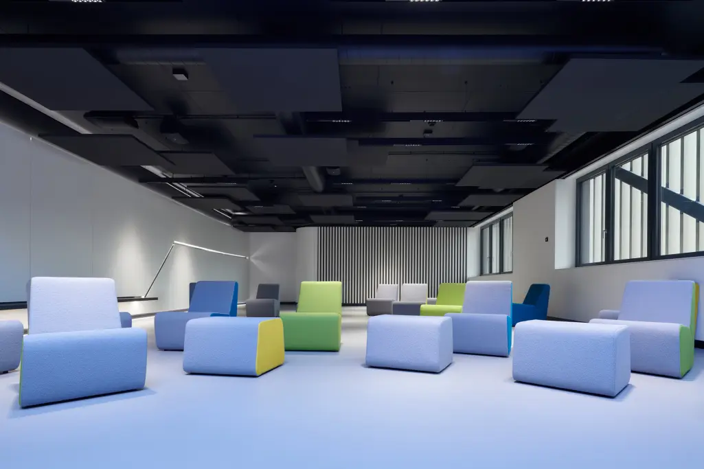 Student residence in Münster, DE; facades in blue, yellow, red: StoTherm Classic with StoColor Dryon