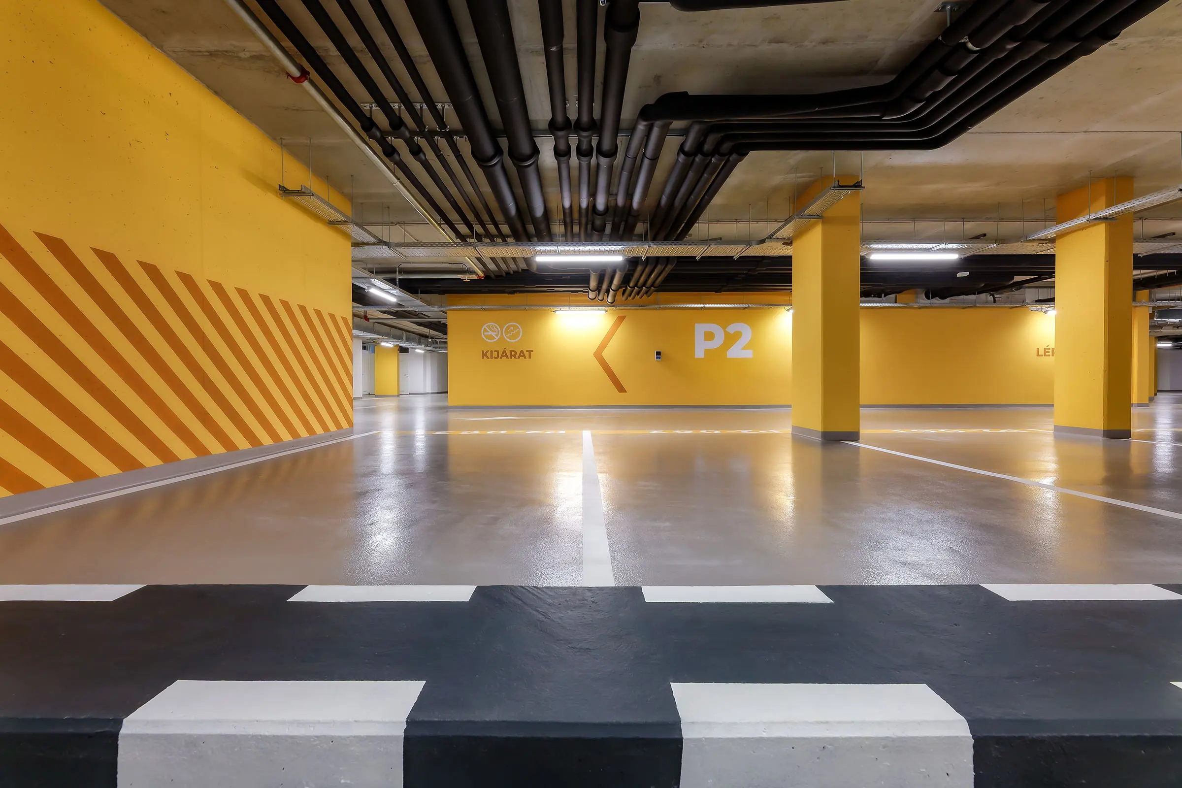 Tiefgarage und Fassade der Beluga Bay Wohnanlage